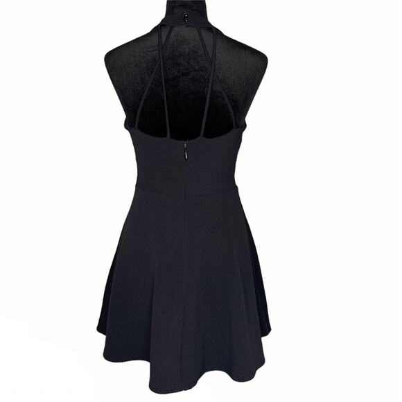 BEBE Black Sexy Cutout Flare Skater Halter Lined Dress size Large - Picture 4 of 13